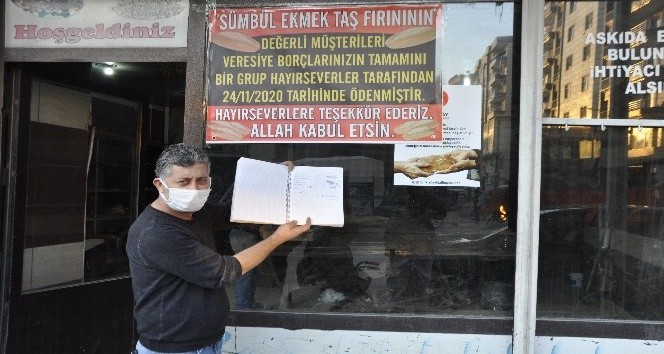 YURTDIŞINDAKİ HAYIRSEVERLER, FIRINCININ VERESİYE DEFTERİNDEKİ BORÇLARI KAPATTI